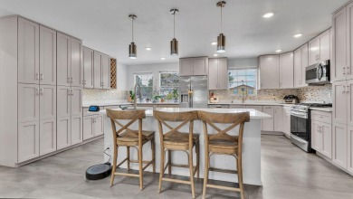 Experience luxury living at 806 Lamp Post Circle Southeast in on The Canyon Club in New Mexico - for sale on GolfHomes.com, golf home, golf lot