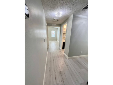 Welcome to this beautifully maintained two-bedroom, two-bath on Lake Fairways Country Club in Florida - for sale on GolfHomes.com, golf home, golf lot