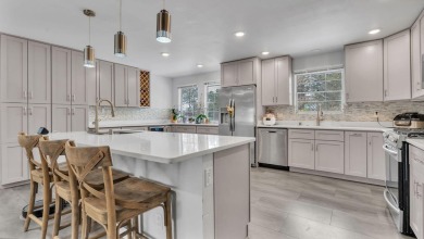 Experience luxury living at 806 Lamp Post Circle Southeast in on The Canyon Club in New Mexico - for sale on GolfHomes.com, golf home, golf lot