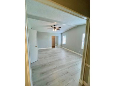 Welcome to this beautifully maintained two-bedroom, two-bath on Lake Fairways Country Club in Florida - for sale on GolfHomes.com, golf home, golf lot