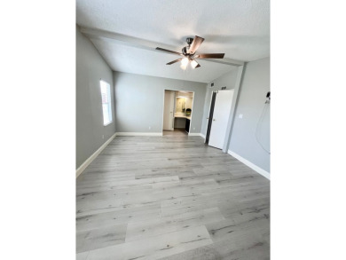 Welcome to this beautifully maintained two-bedroom, two-bath on Lake Fairways Country Club in Florida - for sale on GolfHomes.com, golf home, golf lot