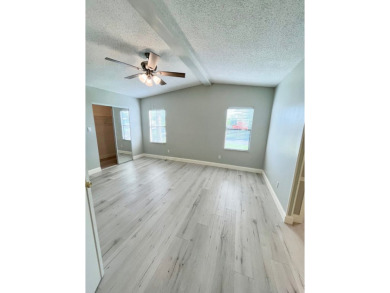 Welcome to this beautifully maintained two-bedroom, two-bath on Lake Fairways Country Club in Florida - for sale on GolfHomes.com, golf home, golf lot