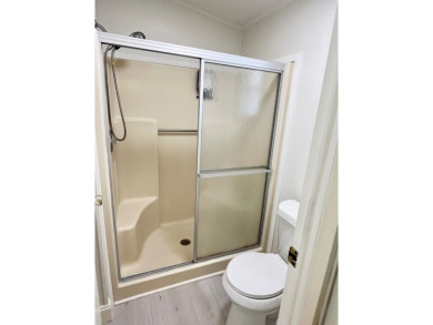 Welcome to this beautifully maintained two-bedroom, two-bath on Lake Fairways Country Club in Florida - for sale on GolfHomes.com, golf home, golf lot