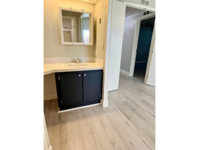 Welcome to this beautifully maintained two-bedroom, two-bath on Lake Fairways Country Club in Florida - for sale on GolfHomes.com, golf home, golf lot