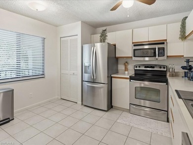 Welcome to this beautifully maintained and spacious two-bedroom on Royal Wood Golf and Country Club in Florida - for sale on GolfHomes.com, golf home, golf lot