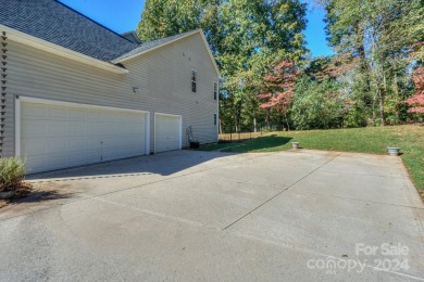 Welcome to this stunning home, located adjacent to the on Mooresville Golf Course in North Carolina - for sale on GolfHomes.com, golf home, golf lot