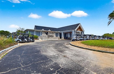 Make this your home for the holidays! The Eagles is a tranquil on The Eagles Golf Course and Club in Florida - for sale on GolfHomes.com, golf home, golf lot