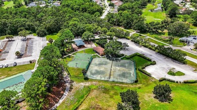 Make this your home for the holidays! The Eagles is a tranquil on The Eagles Golf Course and Club in Florida - for sale on GolfHomes.com, golf home, golf lot