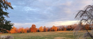 A distinguished living experience awaits presenting a golf on Quail Creek Golf Course in Indiana - for sale on GolfHomes.com, golf home, golf lot