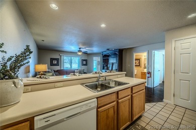 Affordable, move-in-ready walk-in level condo located in Osage on Osage National Golf Club in Missouri - for sale on GolfHomes.com, golf home, golf lot