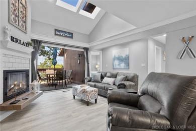 Experience unparalleled lakefront living with this stunning on The Oaks Golf Course in Missouri - for sale on GolfHomes.com, golf home, golf lot