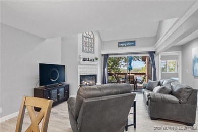 Experience unparalleled lakefront living with this stunning on The Oaks Golf Course in Missouri - for sale on GolfHomes.com, golf home, golf lot