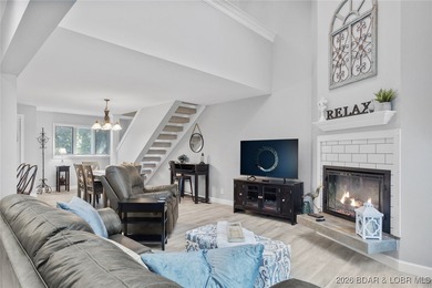 Experience unparalleled lakefront living with this stunning on The Oaks Golf Course in Missouri - for sale on GolfHomes.com, golf home, golf lot