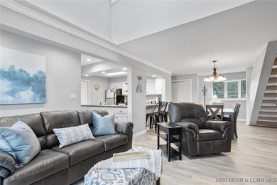 Experience unparalleled lakefront living with this stunning on The Oaks Golf Course in Missouri - for sale on GolfHomes.com, golf home, golf lot