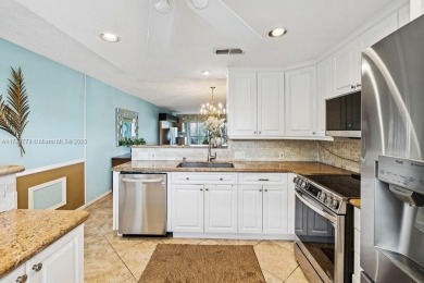 Welcome to this bright and spacious 2-bedroom, 2-bath condo on Wynmoor Golf Course in Florida - for sale on GolfHomes.com, golf home, golf lot