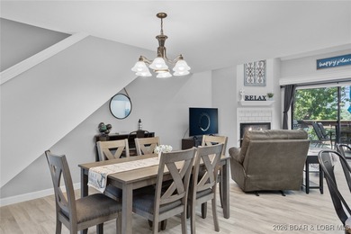 Experience unparalleled lakefront living with this stunning on The Oaks Golf Course in Missouri - for sale on GolfHomes.com, golf home, golf lot