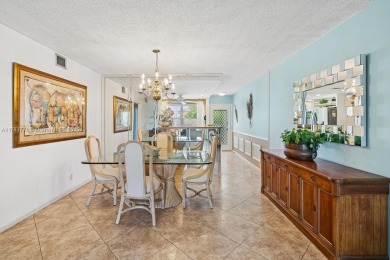 Welcome to this bright and spacious 2-bedroom, 2-bath condo on Wynmoor Golf Course in Florida - for sale on GolfHomes.com, golf home, golf lot