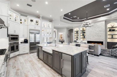 TURNKEY waterfront luxury in exclusive Fiddler's Creek's Oyster on The Rookery At Marco in Florida - for sale on GolfHomes.com, golf home, golf lot