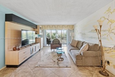 Welcome to this bright and spacious 2-bedroom, 2-bath condo on Wynmoor Golf Course in Florida - for sale on GolfHomes.com, golf home, golf lot