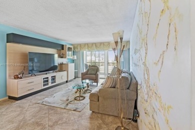 Welcome to this bright and spacious 2-bedroom, 2-bath condo on Wynmoor Golf Course in Florida - for sale on GolfHomes.com, golf home, golf lot