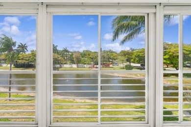 Welcome to this bright and spacious 2-bedroom, 2-bath condo on Wynmoor Golf Course in Florida - for sale on GolfHomes.com, golf home, golf lot