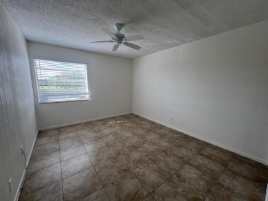 GORGEOUS updated 2 bed 2 bath unit on the 2nd floor in Kings on Kings Point Golf -Flanders Way in Florida - for sale on GolfHomes.com, golf home, golf lot