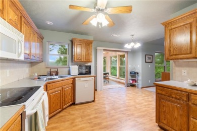Surrounded by the natural beauty of Holiday Island, this 3 bed on Holiday Island Executive Golf Course in Arkansas - for sale on GolfHomes.com, golf home, golf lot