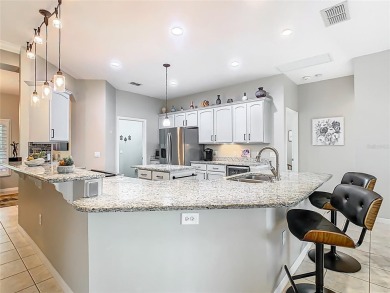 TOTALLY UPGRADED & REMODELED OPEN CONCEPT Carnegie model with on Stonegate Golf Club in Florida - for sale on GolfHomes.com, golf home, golf lot
