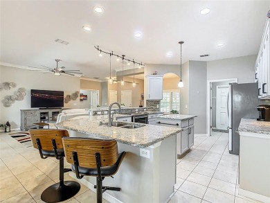 TOTALLY UPGRADED & REMODELED OPEN CONCEPT Carnegie model with on Stonegate Golf Club in Florida - for sale on GolfHomes.com, golf home, golf lot
