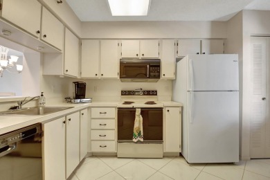 Welcome to this beautifully maintained 2-bedroom, 2-bath on Marina Lakes Golf Course in Florida - for sale on GolfHomes.com, golf home, golf lot
