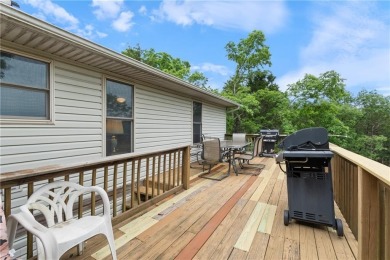 Surrounded by the natural beauty of Holiday Island, this 3 bed on Holiday Island Executive Golf Course in Arkansas - for sale on GolfHomes.com, golf home, golf lot