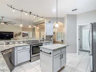 TOTALLY UPGRADED & REMODELED OPEN CONCEPT Carnegie model with on Stonegate Golf Club in Florida - for sale on GolfHomes.com, golf home, golf lot