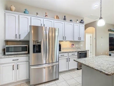 TOTALLY UPGRADED & REMODELED OPEN CONCEPT Carnegie model with on Stonegate Golf Club in Florida - for sale on GolfHomes.com, golf home, golf lot