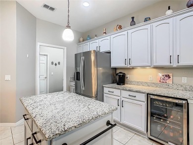 TOTALLY UPGRADED & REMODELED OPEN CONCEPT Carnegie model with on Stonegate Golf Club in Florida - for sale on GolfHomes.com, golf home, golf lot
