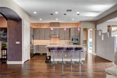 From the moment you step into the expansive great room, you're on Falls Golf Course in Nevada - for sale on GolfHomes.com, golf home, golf lot