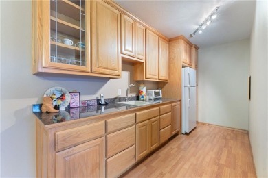 Surrounded by the natural beauty of Holiday Island, this 3 bed on Holiday Island Executive Golf Course in Arkansas - for sale on GolfHomes.com, golf home, golf lot