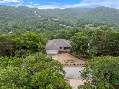 Surrounded by the natural beauty of Holiday Island, this 3 bed on Holiday Island Executive Golf Course in Arkansas - for sale on GolfHomes.com, golf home, golf lot