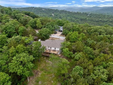Surrounded by the natural beauty of Holiday Island, this 3 bed on Holiday Island Executive Golf Course in Arkansas - for sale on GolfHomes.com, golf home, golf lot