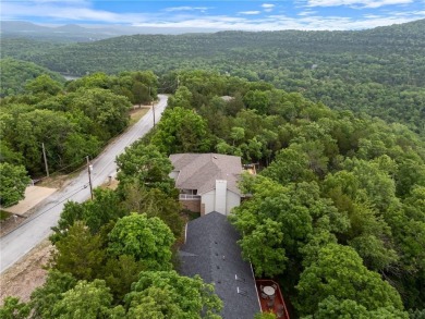 Surrounded by the natural beauty of Holiday Island, this 3 bed on Holiday Island Executive Golf Course in Arkansas - for sale on GolfHomes.com, golf home, golf lot