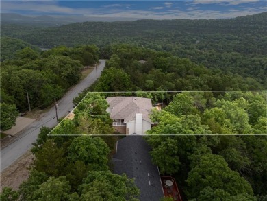Surrounded by the natural beauty of Holiday Island, this 3 bed on Holiday Island Executive Golf Course in Arkansas - for sale on GolfHomes.com, golf home, golf lot
