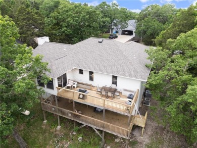 Surrounded by the natural beauty of Holiday Island, this 3 bed on Holiday Island Executive Golf Course in Arkansas - for sale on GolfHomes.com, golf home, golf lot