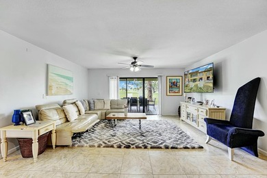 Welcome to this beautifully maintained 3-bedroom, 2-bath home on Fountains Golf and Country Club in Florida - for sale on GolfHomes.com, golf home, golf lot