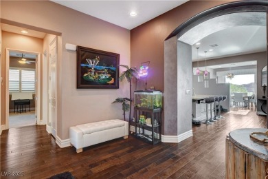 From the moment you step into the expansive great room, you're on Falls Golf Course in Nevada - for sale on GolfHomes.com, golf home, golf lot