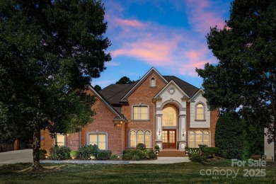 This magnificent home spans three-levels and offers stunning on Verdict Ridge Golf and Country Club in North Carolina - for sale on GolfHomes.com, golf home, golf lot