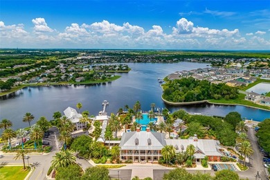 Gorgeous pool home in the gated resort-style community of on Apollo Beach Golf and Sea Club in Florida - for sale on GolfHomes.com, golf home, golf lot