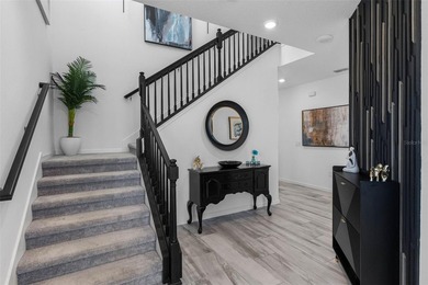 Gorgeous pool home in the gated resort-style community of on Apollo Beach Golf and Sea Club in Florida - for sale on GolfHomes.com, golf home, golf lot