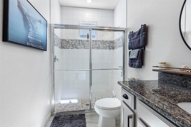 Gorgeous pool home in the gated resort-style community of on Apollo Beach Golf and Sea Club in Florida - for sale on GolfHomes.com, golf home, golf lot