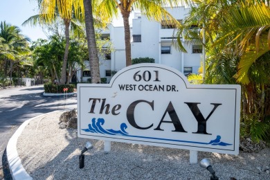 Welcome to your spacious retreat at The Cay in Key Colony Beach! on Key Colony Beach Golf Course in Florida - for sale on GolfHomes.com, golf home, golf lot