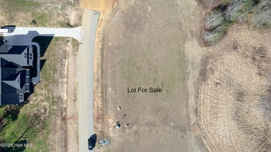 Build your dream home on this stunning vacant lot in Timberlake on TimberLake Golf Club in North Carolina - for sale on GolfHomes.com, golf home, golf lot