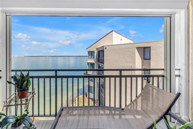 Top Floor condo with sweeping views of the Marina at Isla Del on Isla Del Sol Yacht and Country Club in Florida - for sale on GolfHomes.com, golf home, golf lot